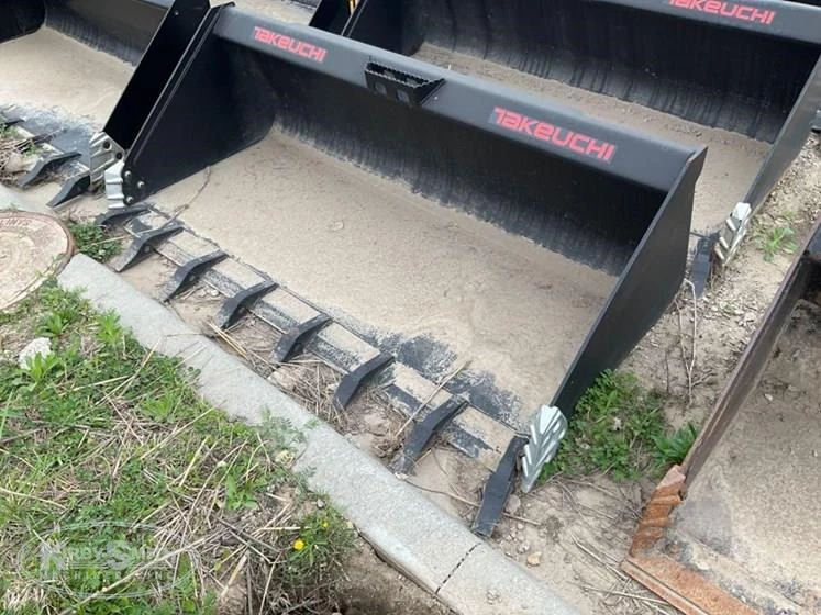 Used Takeuchi Bucket in yard